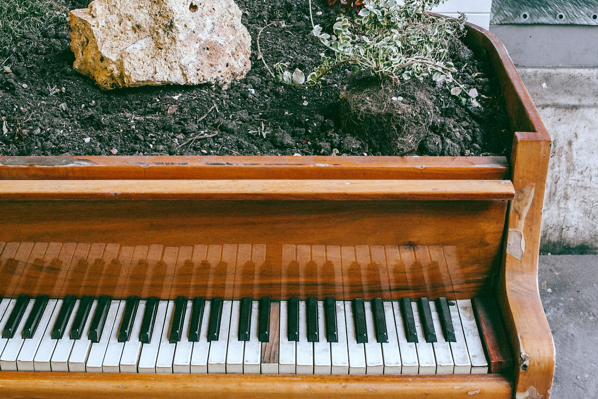 An upright piano ready to be moved