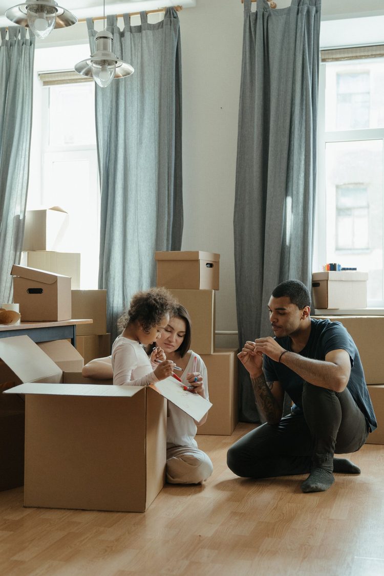 A family unpacking in their new home in Westfield, MA