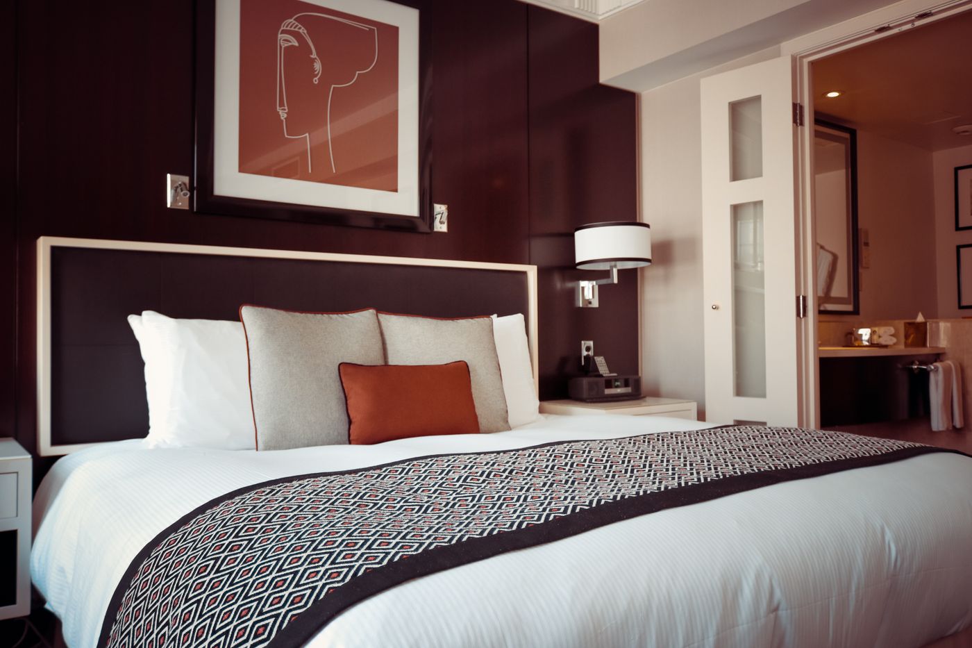 A hotel guest room staged with new furniture